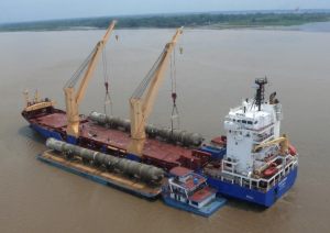 Deethanizer Towers discharging from ship to barge in the Amazon River